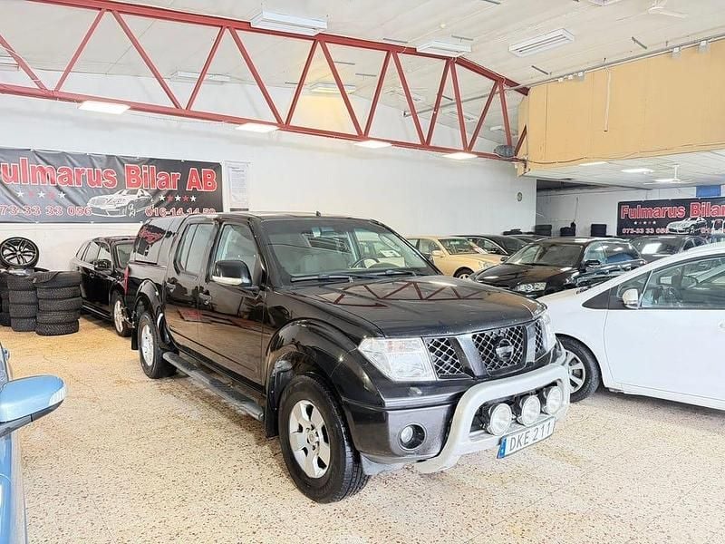 Svart Begagnad 2008 Nissan Navara Pickup | 89 900 kr (Marknadspris) - Bild 1/4