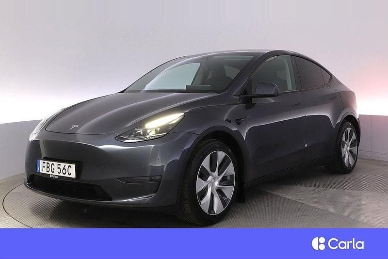 Grå Begagnad 2021 Tesla Model Y Long Range AWD SUV | 369 900 kr (Marknadspris) - Bild 1/4