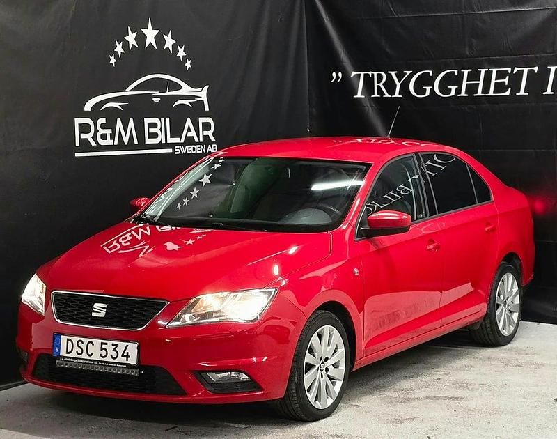 Ljusröd (röd) Begagnad 2014 Seat Toledo Halvkombi | 54 800 kr - Bild 1/4