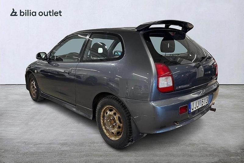 Begagnad Mitsubishi Colt 103 HK (75 kW) 2003 Mgrå Halvkombi