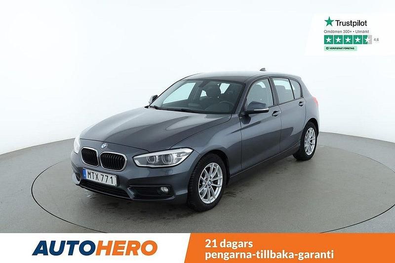 Grå Begagnad 2015 BMW 116 Advantage Halvkombi | 114 000 kr (Marknadspris) - Bild 1/4