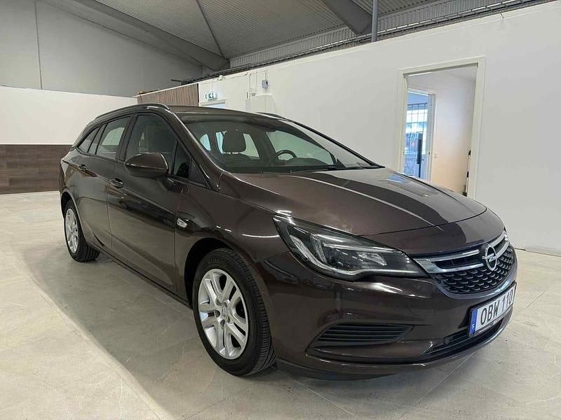 Brun Begagnad 2016 Opel Astra Enjoy Kombi | 59 900 kr (Marknadspris) - Bild 1/4