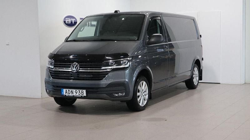 Grå (indium grey metallic) Begagnad 2021 VW T6.1 Van | 419 900 kr (Superpris) - Bild 1/4