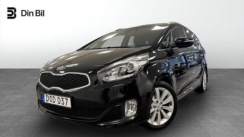 Svart Begagnad 2014 Kia Carens Minibuss | 94 900 kr (Marknadspris) - Bild 1/4