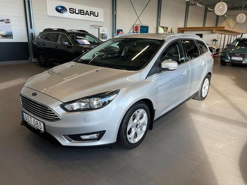 Grå Begagnad 2014 Ford Focus Titanium Kombi | 79 000 kr (Marknadspris) - Bild 1/4