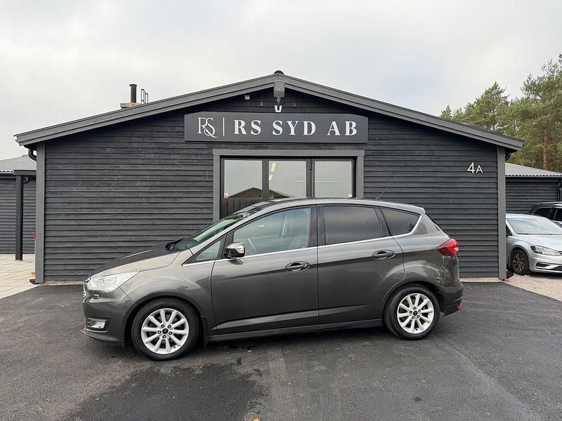 Grå Begagnad 2015 Ford C-MAX Titanium Minibuss | 99 000 kr (Marknadspris) - Bild 1/4
