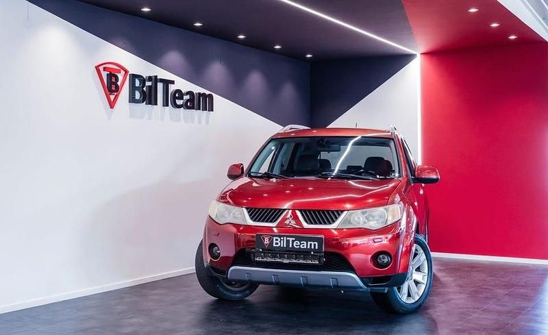 Mörkröd Begagnad 2008 Mitsubishi Outlander SUV | 59 900 kr (Bra pris) - Bild 1/4