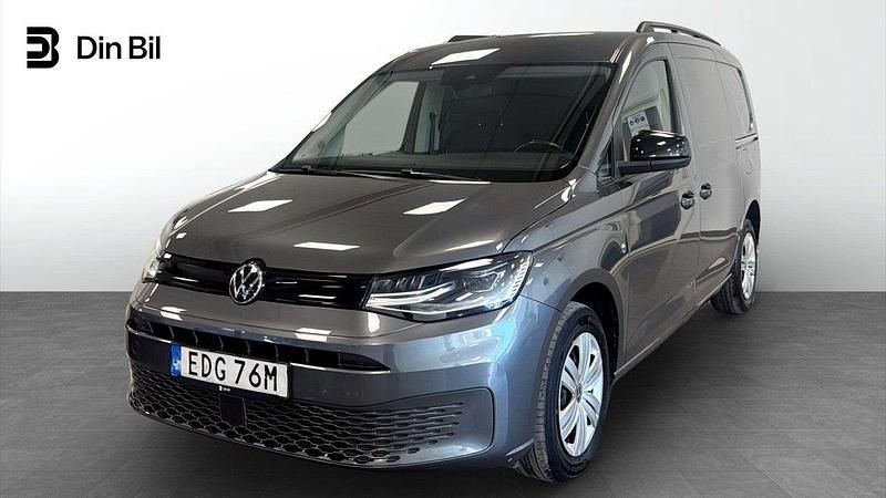 Grå (indiumgrü metallic) Begagnad 2022 VW Caddy Maxi Minibuss | 299 900 kr (Marknadspris) - Bild 1/4