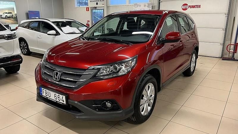 Passion red Begagnad 2013 Honda CR-V Elegance SUV | 149 900 kr (Marknadspris) - Bild 1/4