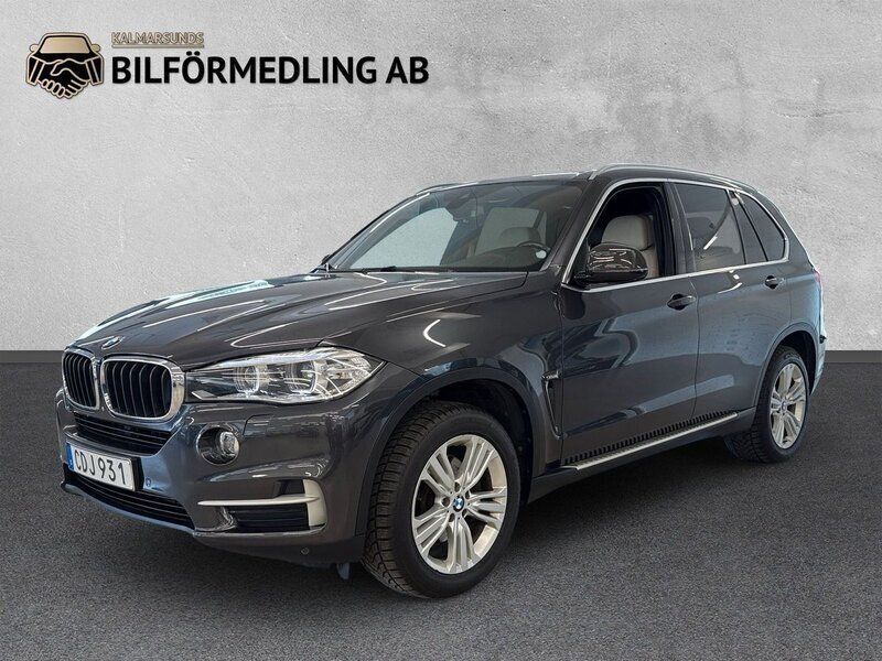 Grå Begagnad 2014 BMW X5 SUV | 298 800 kr (Marknadspris) - Bild 1/4