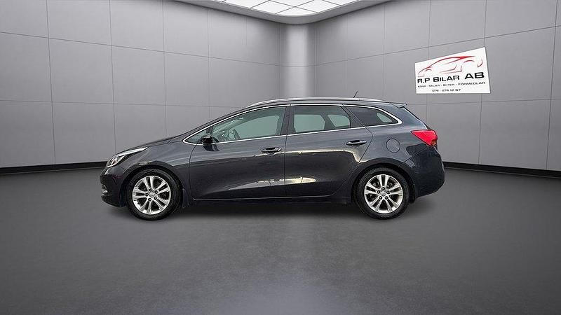 Grå Begagnad 2013 Kia Ceed Sportswagon Kombi | 84 900 kr (Marknadspris) - Bild 1/4