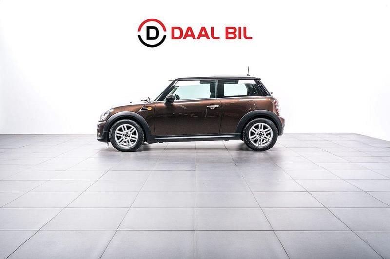 Brun Begagnad 2012 Mini Cooper D Chili Halvkombi | 84 700 kr (Marknadspris) - Bild 1/4