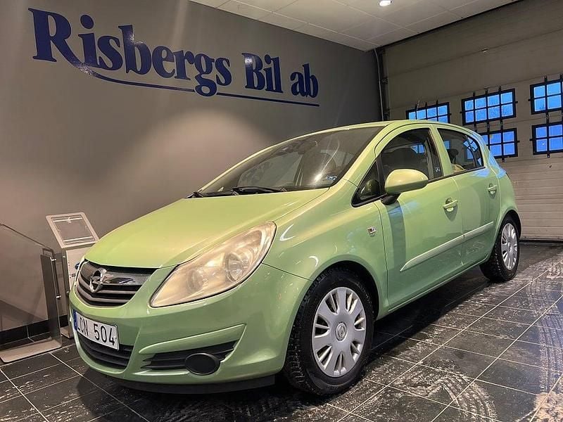 Begagnad Opel Corsa Enjoy 86 HK (63 kW) 2010 Grön Halvkombi