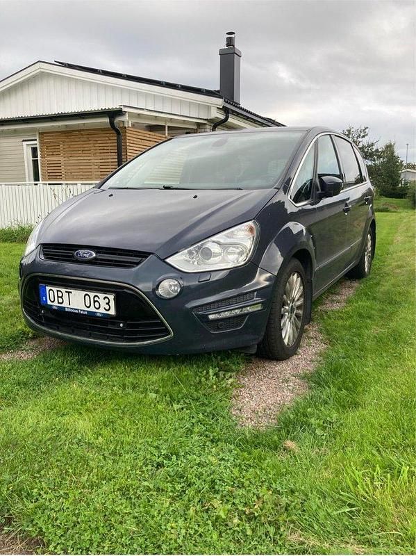 Grå Begagnad 2014 Ford S-MAX Business Edition Minibuss | 85 000 kr (Marknadspris) - Bild 1/4