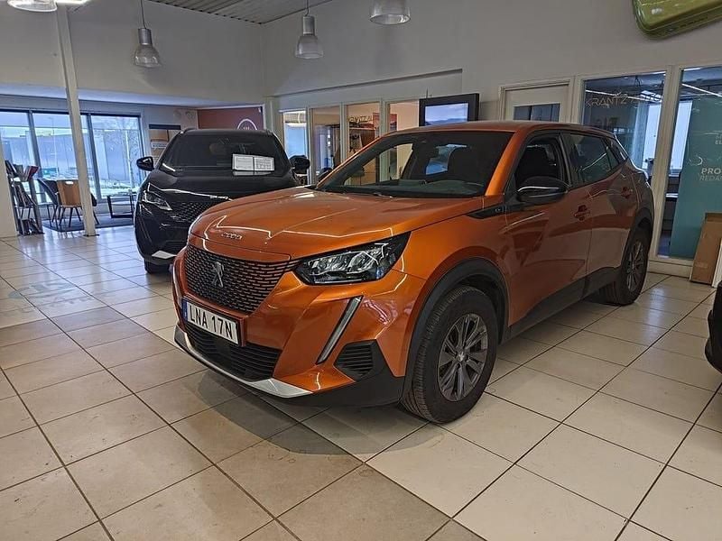 Begagnad Peugeot e-2008 100 kW (136 HK) 2022 Orange SUV