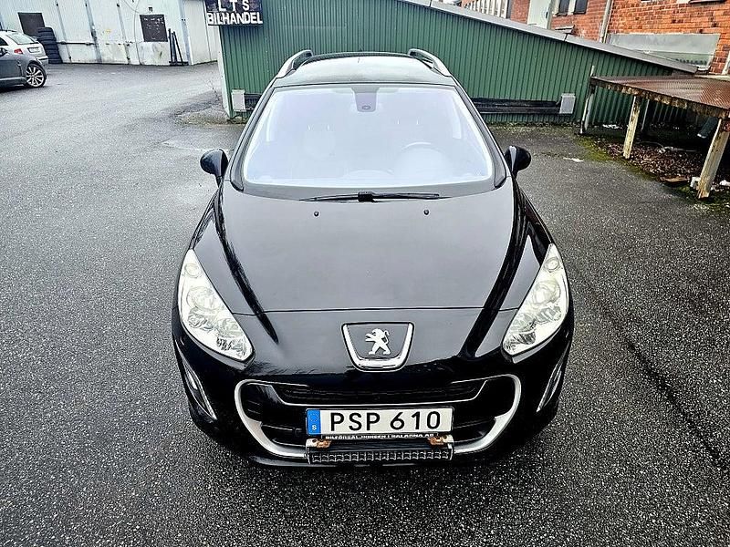 Begagnad Peugeot 308 SW 112 HK (82 kW) 2012 Svart Kombi