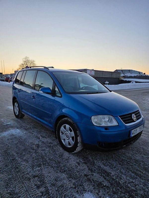Begagnad VW Touran 150 HK (110 kW) 2005 Blå Minibuss