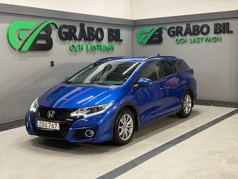 Begagnad Honda Civic Elegance 120 HK (88 kW) 2017 Blå Kombi