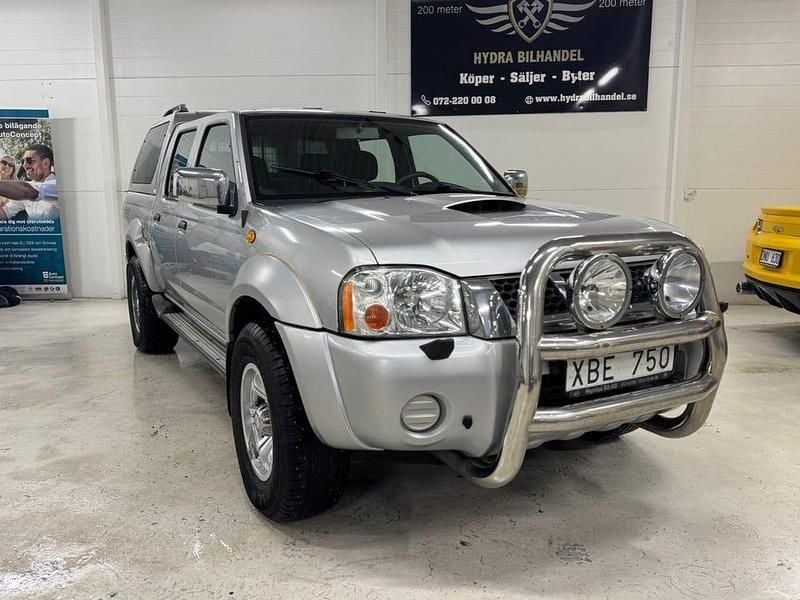 Silver Begagnad 2004 Nissan Navara Pickup | 65 000 kr (Lite dyr) - Bild 1/4