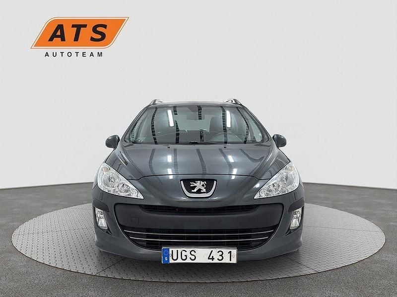 Mörkgrå (grå) Begagnad 2011 Peugeot 308 Kombi | 59 900 kr (Marknadspris) - Bild 1/4