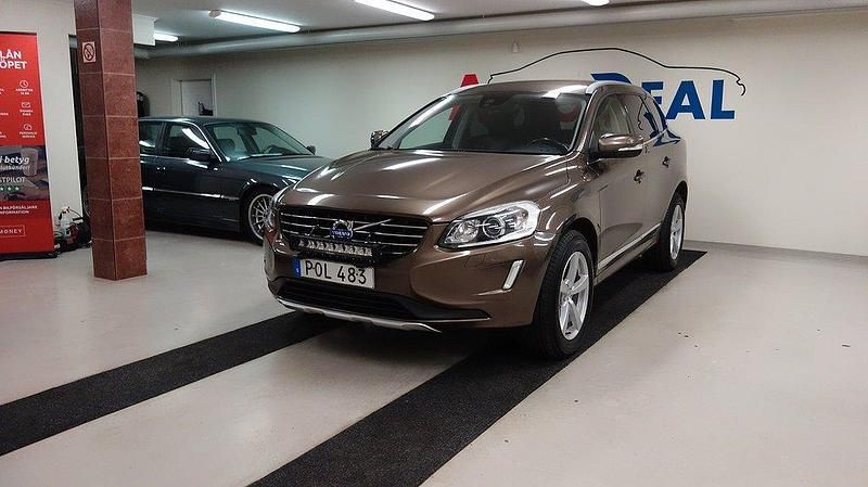 Brun Begagnad 2014 Volvo XC60 Summum SUV | 139 902 kr (Marknadspris) - Bild 1/4