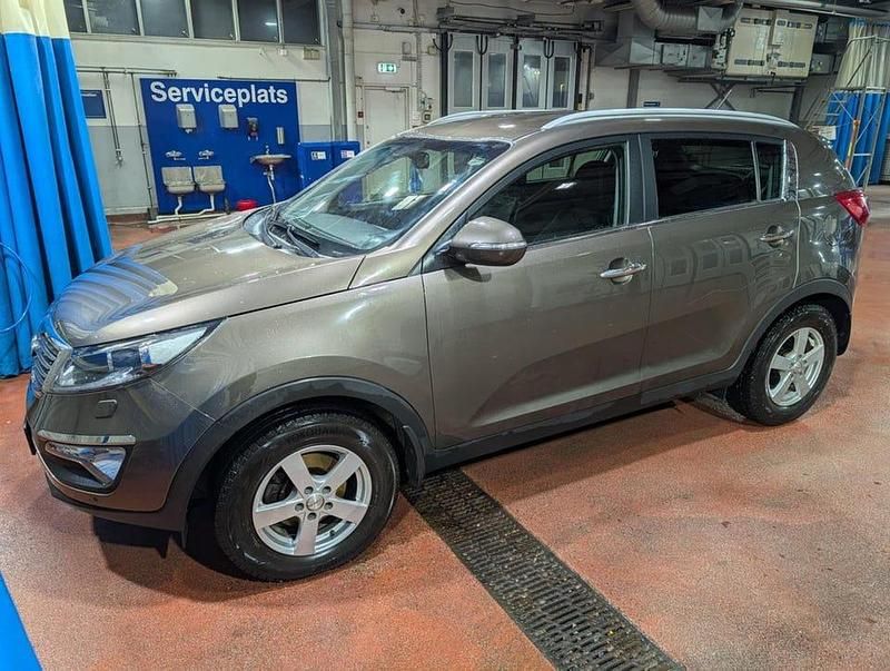 Brun Begagnad 2013 Kia Sportage EX SUV | 103 000 kr (Marknadspris) - Bild 1/4