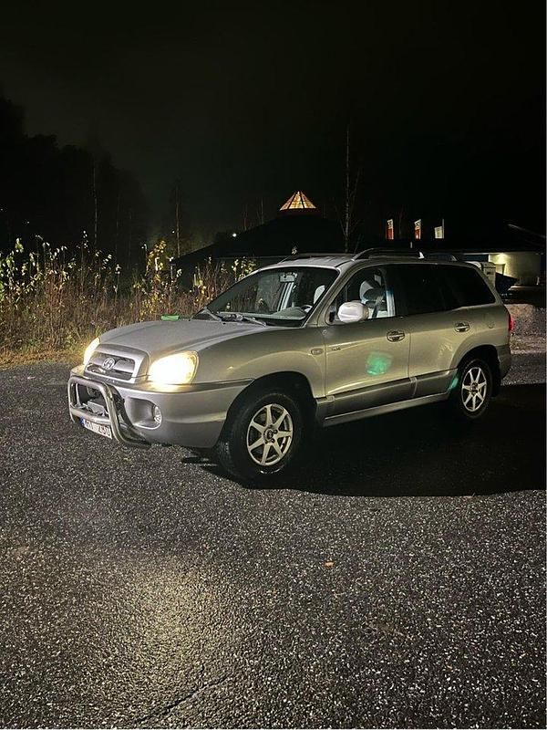 Silver Begagnad 2006 Hyundai Santa Fe SUV | 25 000 kr (Marknadspris) - Bild 1/4