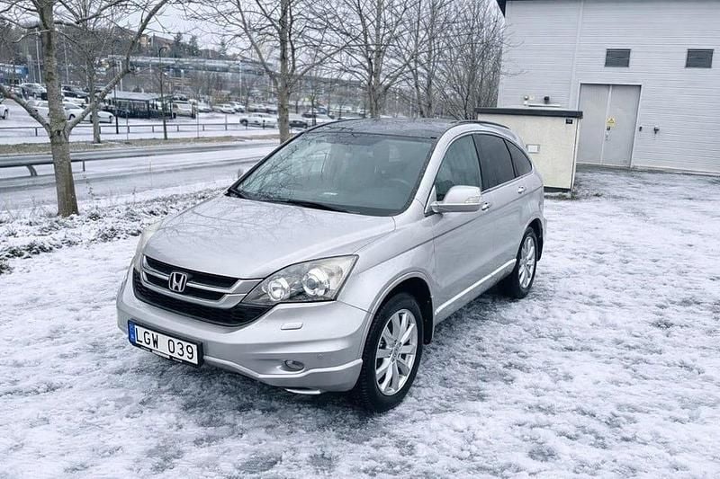 Silver Begagnad 2011 Honda CR-V Executive SUV | 57 500 kr (Bra pris) - Bild 1/4