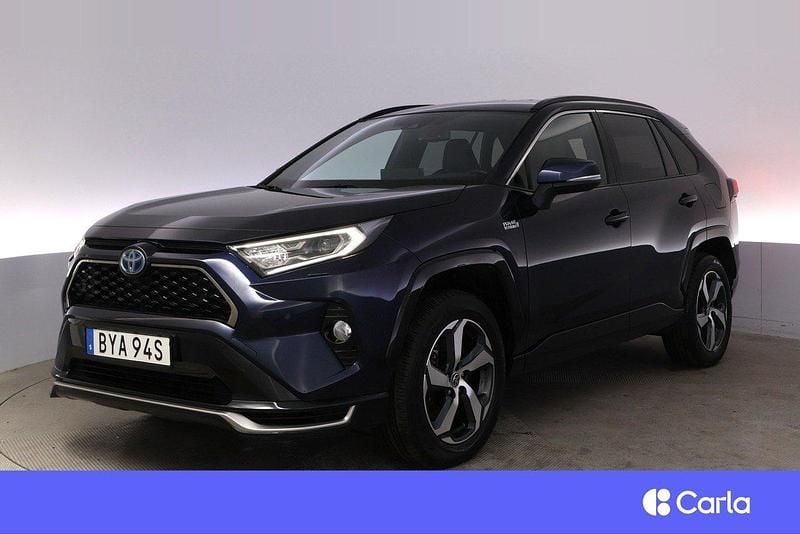 Mörkblå (blå) Begagnad 2021 Toyota RAV4 Hybrid Edition SUV | 387 900 kr (Marknadspris) - Bild 1/4