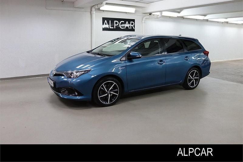 Blå Begagnad 2017 Toyota Auris Hybrid Comfort Kombi | 159 900 kr (Marknadspris) - Bild 1/4