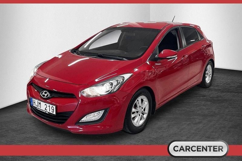 Röd Begagnad 2012 Hyundai i30 Halvkombi | 89 500 kr (Marknadspris) - Bild 1/4