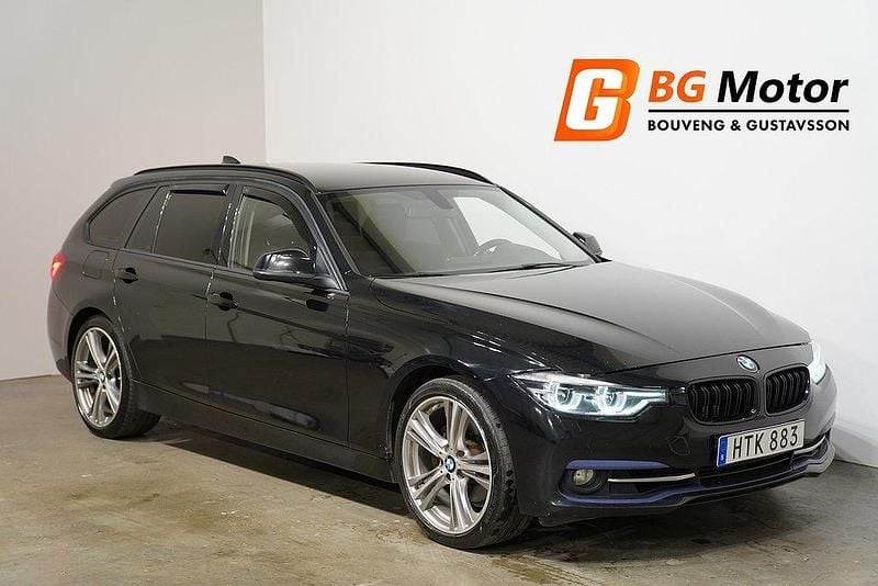 Svart Begagnad 2015 BMW 330 Sport Line Kombi | 194 600 kr (Marknadspris) - Bild 1/4