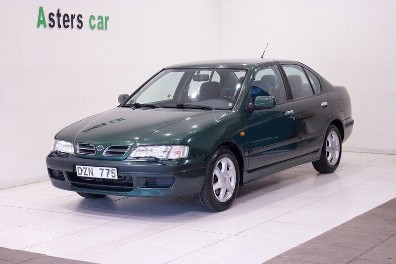 Mörkgrön Begagnad 1999 Nissan Primera Sedan | 14 900 kr - Bild 1/4