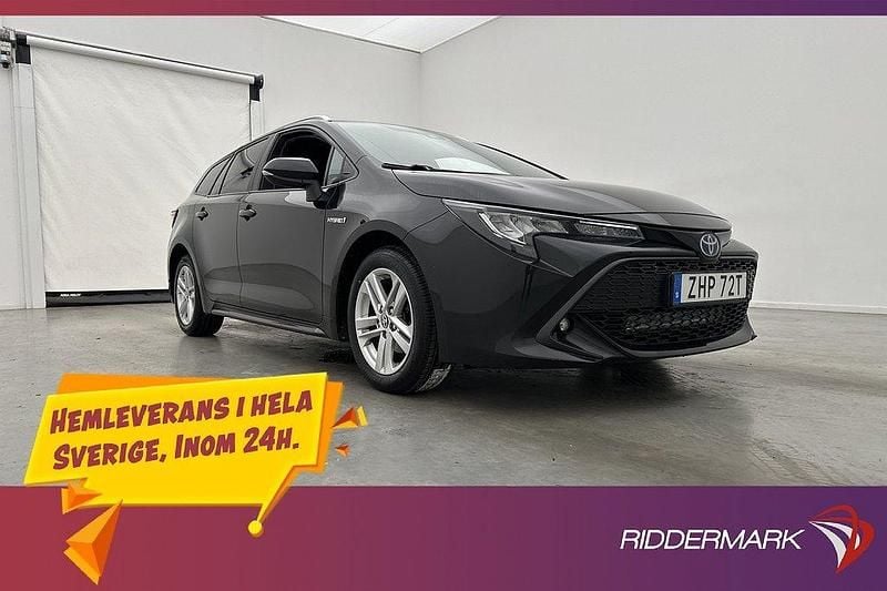 Svart Begagnad 2020 Toyota Corolla Hybrid Kombi | 203 900 kr (Marknadspris) - Bild 1/3