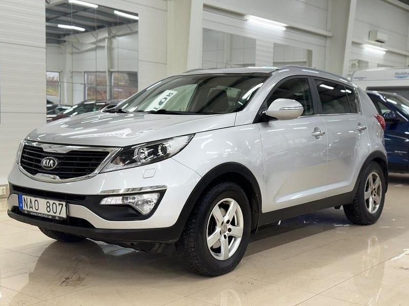 Grå metallic Begagnad 2013 Kia Sportage EX SUV | 79 900 kr (Marknadspris) - Bild 1/4