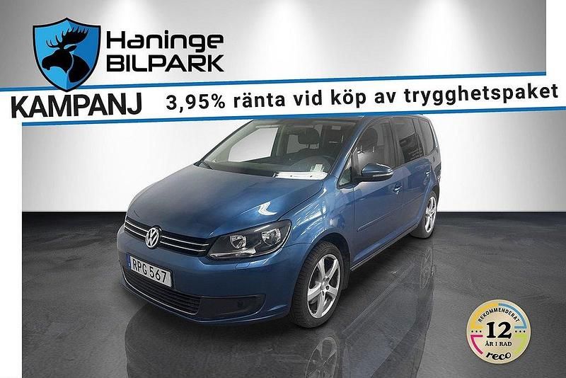 Blå Begagnad 2014 VW Touran Minibuss | 69 900 kr - Bild 1/2