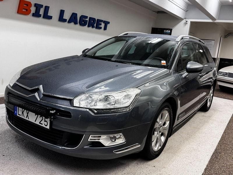 Grå Begagnad 2011 Citroën C5 Kombi | 54 900 kr (Marknadspris) - Bild 1/4