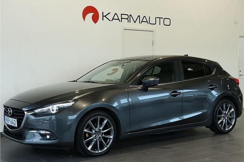 Grå Begagnad 2018 Mazda 3 Vision Halvkombi | 139 900 kr (Marknadspris) - Bild 1/4