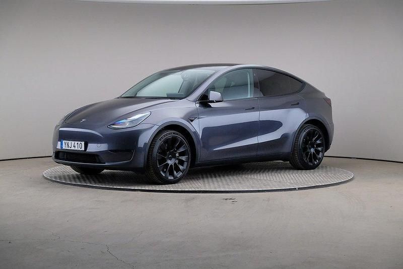 Grå (midnattssilver (metallic)) Begagnad 2022 Tesla Model Y Long Range AWD SUV | 379 000 kr (Marknadspris) - Bild 1/4