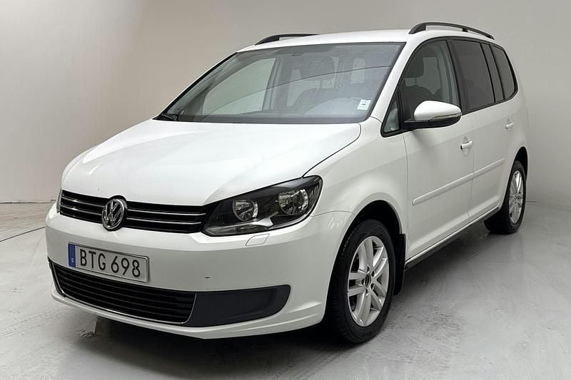 Vit Begagnad 2014 VW Touran Minibuss | 60 000 kr - Bild 1/4