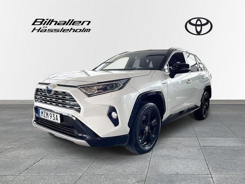 Vit Begagnad 2019 Toyota RAV4 Hybrid Style SUV | 319 900 kr (Marknadspris) - Bild 1/4