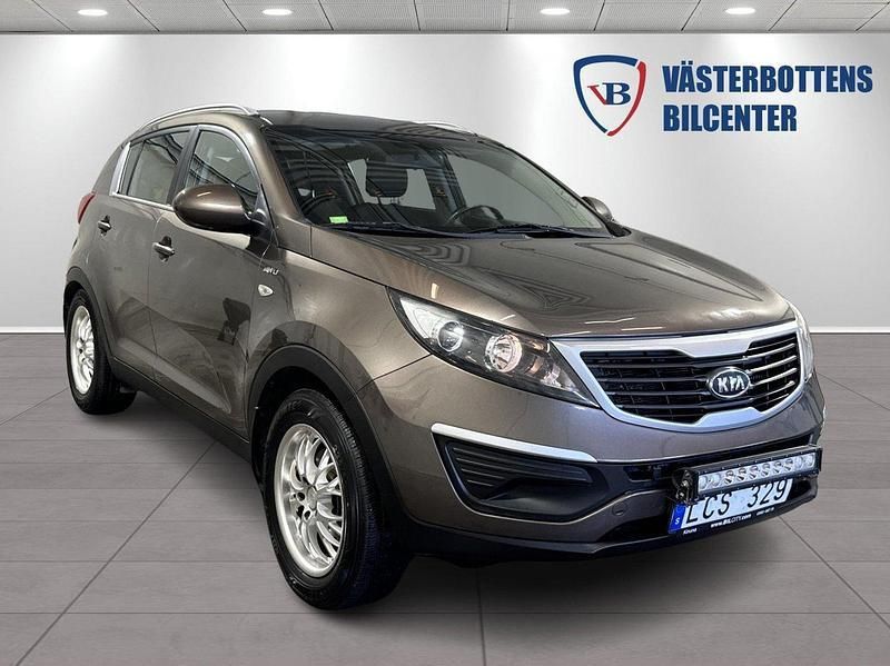 Ljusbrun (brun) Begagnad 2011 Kia Sportage EX SUV | 84 900 kr (Marknadspris) - Bild 1/4