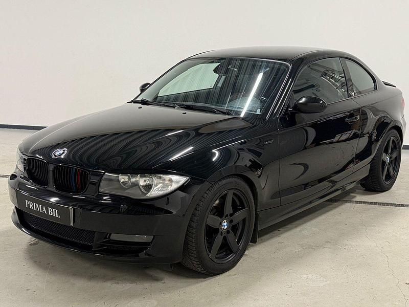 Svart Begagnad 2009 BMW 123 Coupé Advantage Sportkupé | 94 900 kr - Bild 1/4