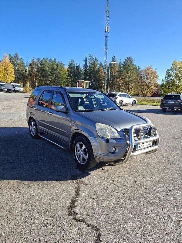 Grå Begagnad 2005 Honda CR-V SUV | 25 000 kr (Marknadspris) - Bild 1/4