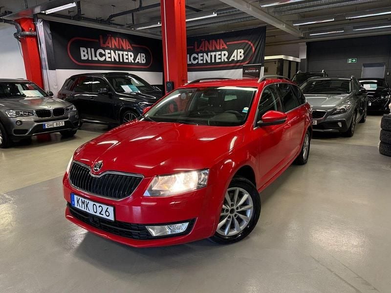 Röd Begagnad 2015 Skoda Octavia Kombi | 129 900 kr (Lite dyr) - Bild 1/4