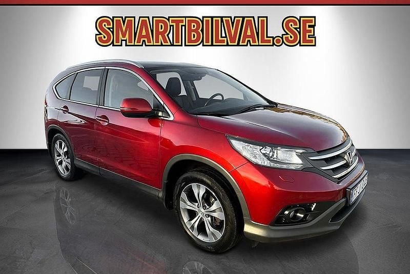 Rödmetallic Begagnad 2013 Honda CR-V Executive SUV | 139 900 kr (Marknadspris) - Bild 1/4