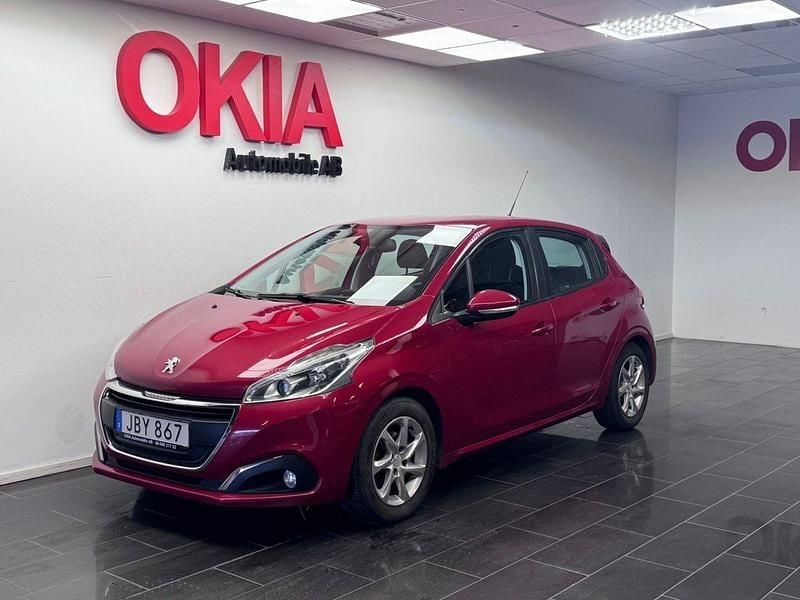 Mörkröd (röd) Begagnad 2015 Peugeot 208 Halvkombi | 69 990 kr (Marknadspris) - Bild 1/4