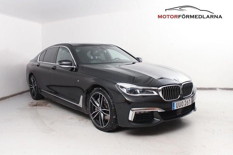 Svart Begagnad 2019 BMW 750 M Sport Sedan | 449 000 kr - Bild 1/4