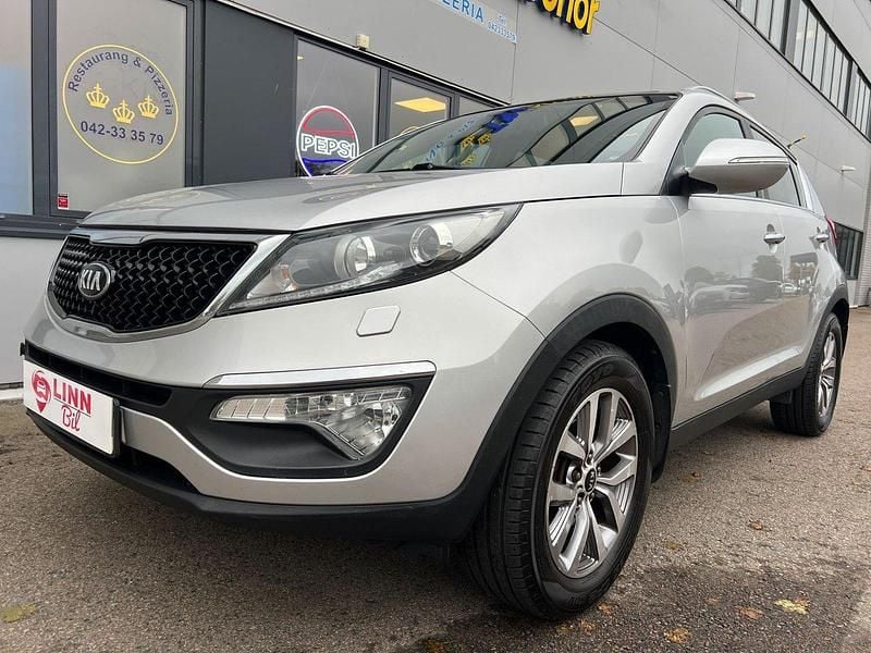 Grå Begagnad 2015 Kia Sportage SUV | 88 999 kr (Marknadspris) - Bild 1/4