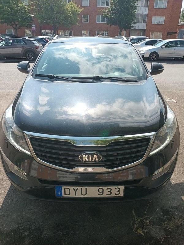 Svart Begagnad 2013 Kia Sportage EX SUV | 56 000 kr (Lite dyr) - Bild 1/4